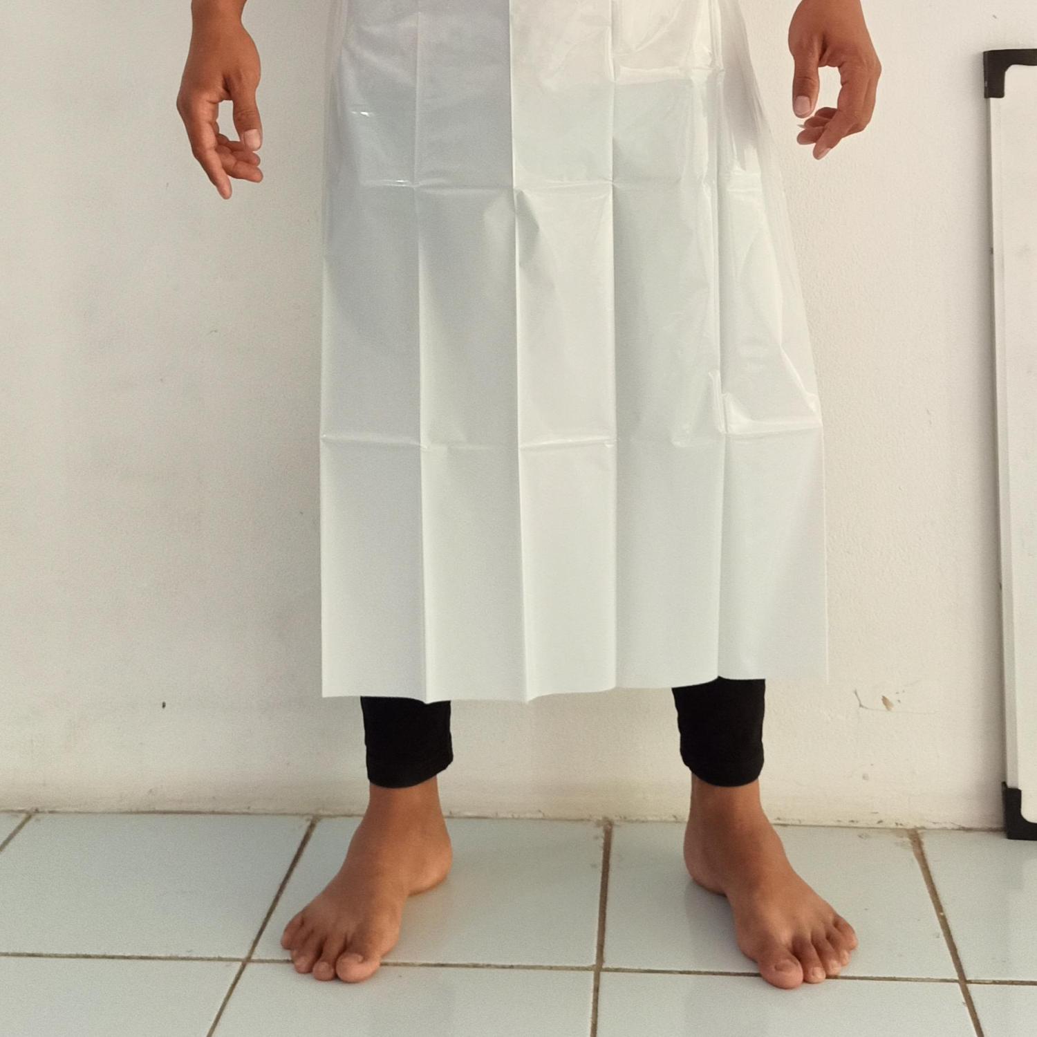 Apron Plastik Putih Disphosible 30 mikron