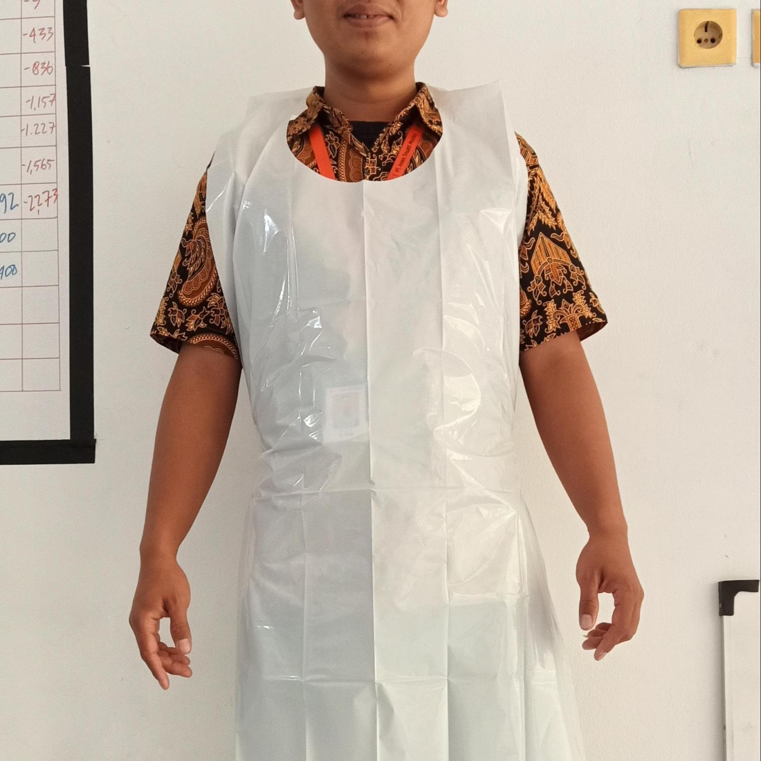 Apron Plastik Putih Disphosible 30 mikron